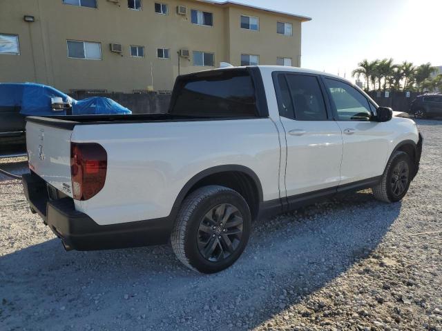 Photo 3 from auction – 2021 HONDA RIDGELINE with VIN 5FPYK3F1XMB015473