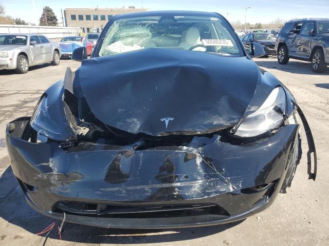 Photo 5 from auction – 2023 TESLA MODEL Y with VIN 7SAYGAEE0PF824894
