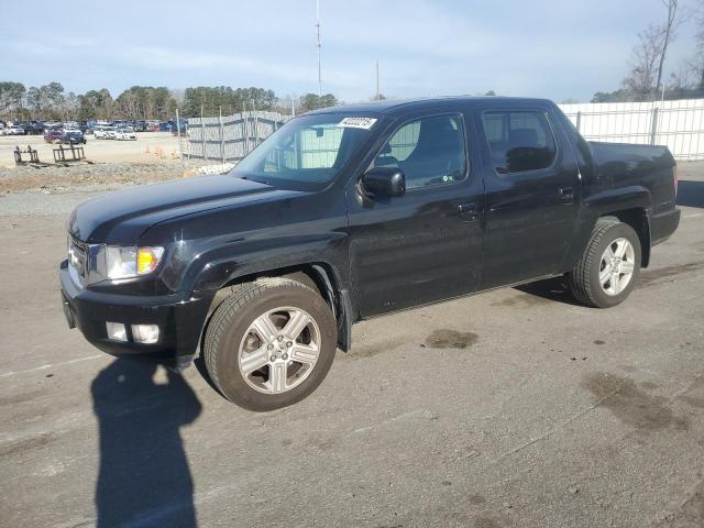 HONDA RIDGELINE 2010 with VIN 5FPYK1F53AB010683 - Photo from auction