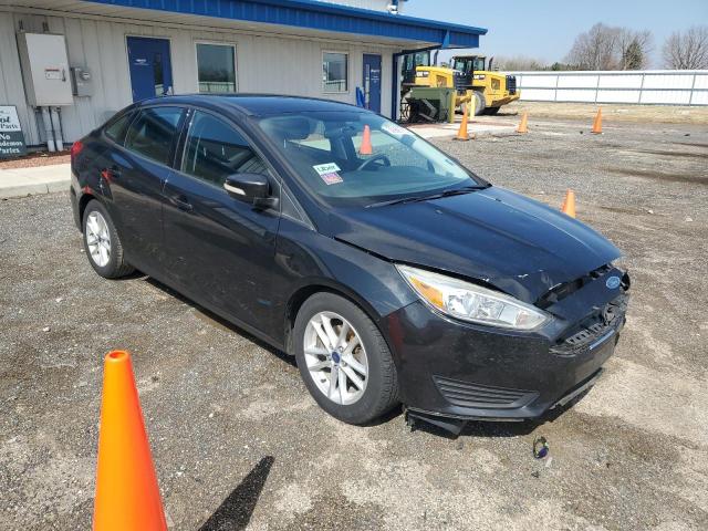 Снимка 4 от търг – 2015 FORD FOCUS SE с VIN 1FADP3F21FL305057