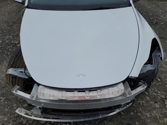 Photo 12 from auction – 2023 TESLA MODEL Y with VIN 7SAYGDEE5PA073077