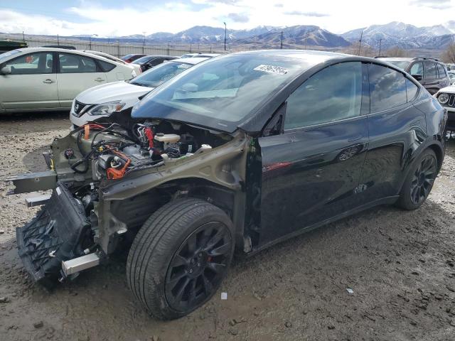 TESLA MODEL Y 2024 with VIN 7SAYGDEF5RA269550 - Photo from auction