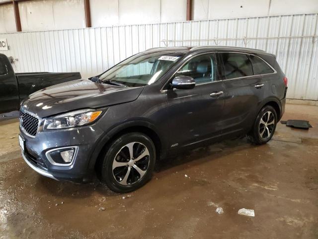 KIA SORENTO EX 2016 with VIN 5XYPHDA18GG028395 - Photo from auction