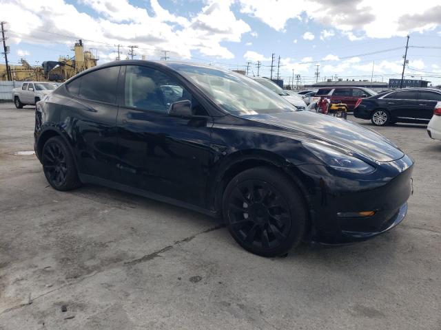 Photo 4 from auction – 2023 TESLA MODEL Y with VIN 7SAYGDEE1PA057927