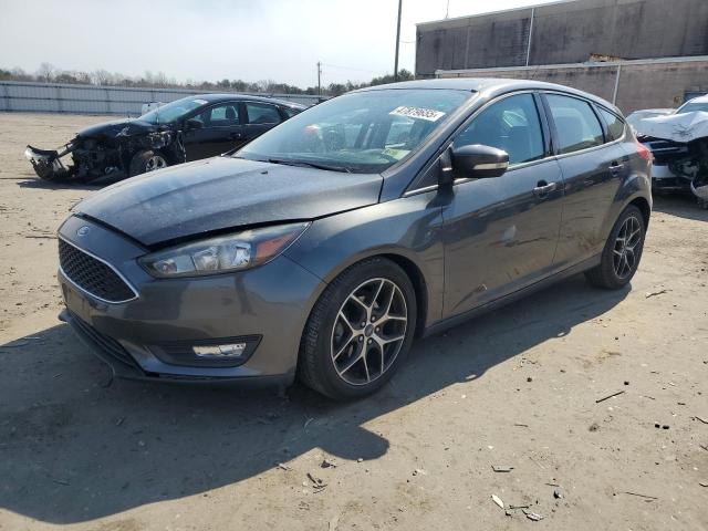 FORD FOCUS SEL 2017 with VIN 1FADP3M25HL338746 - Photo from auction