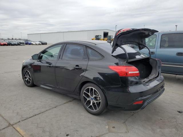 Снимка 2 от търг – 2015 FORD FOCUS SE с VIN 1FADP3F24FL220925