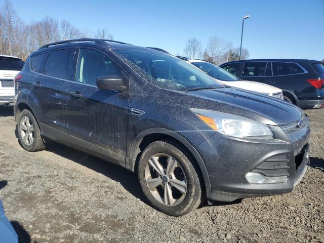 Photo 4 from auction – 2015 FORD ESCAPE SE with VIN 1FMCU9G90FUB10165