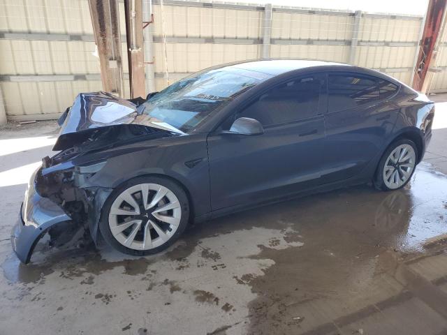 TESLA MODEL 3 2022 с VIN 5YJ3E1EA4NF285493 - Снимка от търг