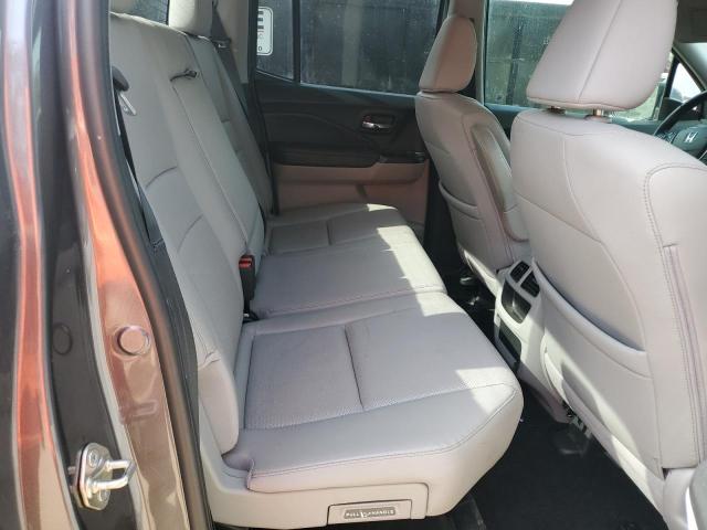 Photo 10 from auction – 2017 HONDA RIDGELINE with VIN 5FPYK2F65HB010628