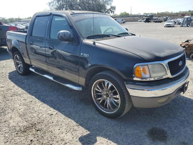 Снимка 4 от търг – 2003 FORD F150 SUPER с VIN 1FTRW07L83KD54346