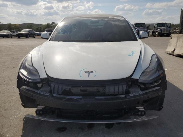 Снимка 5 от търг – 2022 TESLA MODEL 3 с VIN 5YJ3E1EB4NF167842