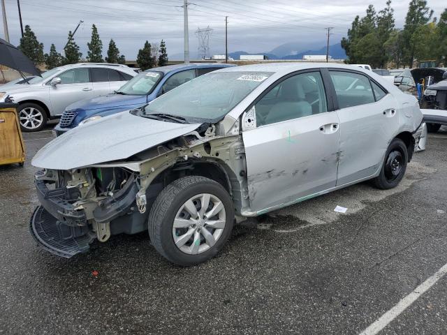 TOYOTA COROLLA L 2015 with VIN 5YFBURHE7FP285716 - Photo from auction