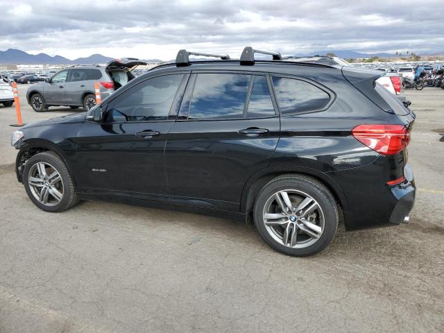 Photo 2 from auction – 2016 BMW X1 XDRIVE2 with VIN WBXHT3C36G5E53172