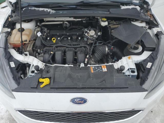 Снимка 11 от търг – 2017 FORD FOCUS с VIN 1FADP3M21HL240636