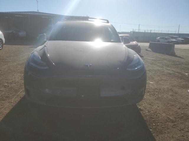 Photo 5 from auction – 2023 TESLA MODEL Y with VIN 7SAYGDEE2PA032938