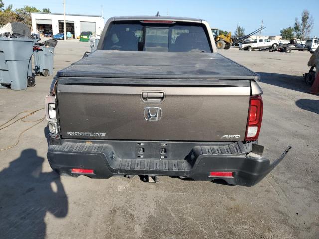 Photo 6 from auction – 2022 HONDA RIDGELINE with VIN 5FPYK3F53NB037481