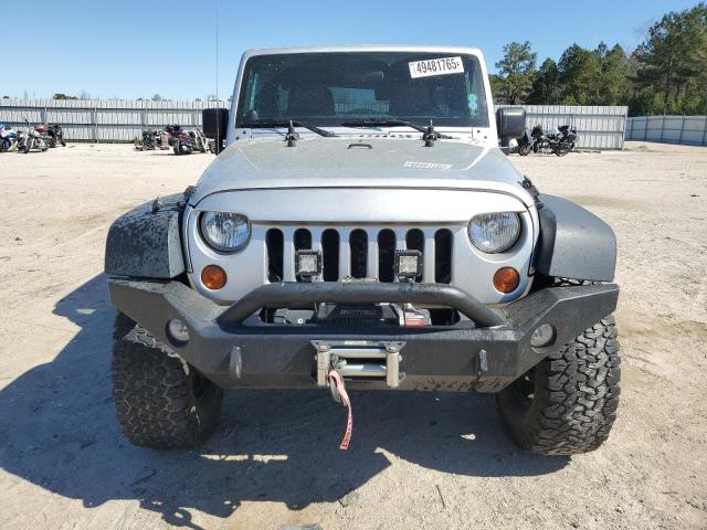 Photo 5 from auction – 2011 JEEP WRANGLER U with VIN 1J4BA5H13BL562938