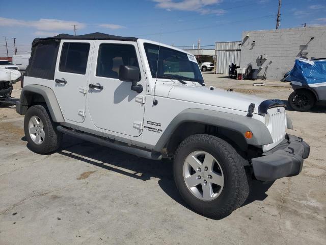 Photo 4 from auction – 2011 JEEP WRANGLER U with VIN 1J4BA3H19BL574886