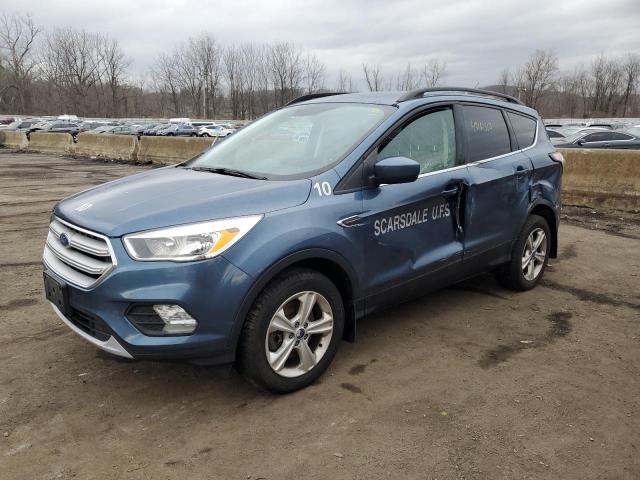 FORD ESCAPE SE 2018 with VIN 1FMCU9GD2JUA74783 - Photo from auction