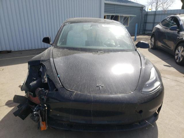 Photo 5 from auction – 2021 TESLA MODEL 3 with VIN 5YJ3E1EB4MF999664