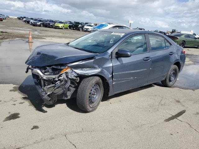 TOYOTA COROLLA L 2014 with VIN 5YFBURHE7EP056211 - Photo from auction
