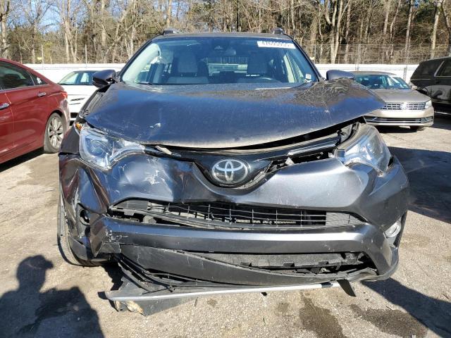 Photo 5 from auction – 2017 TOYOTA RAV4 XLE with VIN JTMRFREV1HD216703