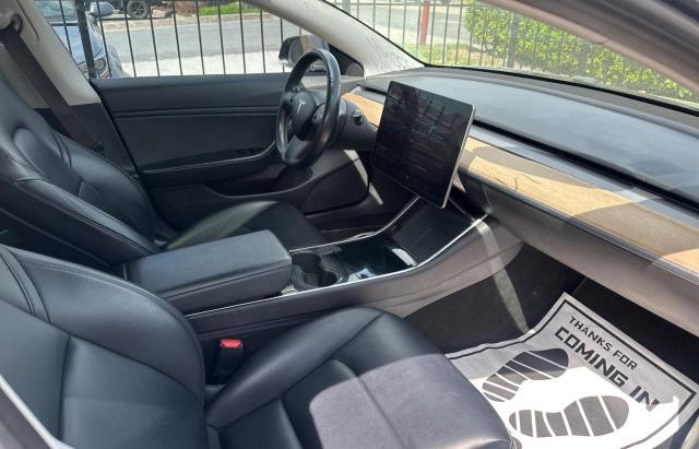 Снимка 5 от търг – 2018 TESLA MODEL 3 с VIN 5YJ3E1EB0JF117496