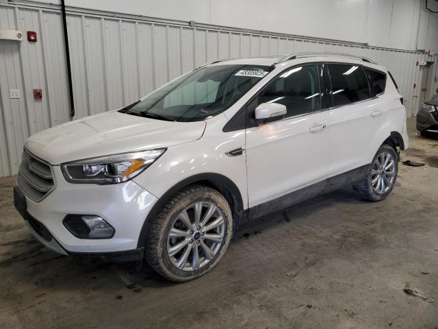 FORD ESCAPE TIT 2018 with VIN 1FMCU9J99JUC72586 - Photo from auction