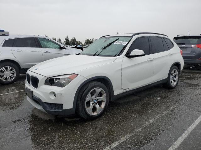 BMW X1 2014 with VIN WBAVM1C54EVW49427 - Photo from auction