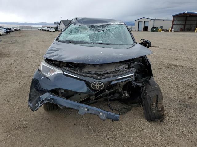 Photo 5 from auction – 2018 TOYOTA RAV4 LE with VIN JTMBFREV2JJ738068