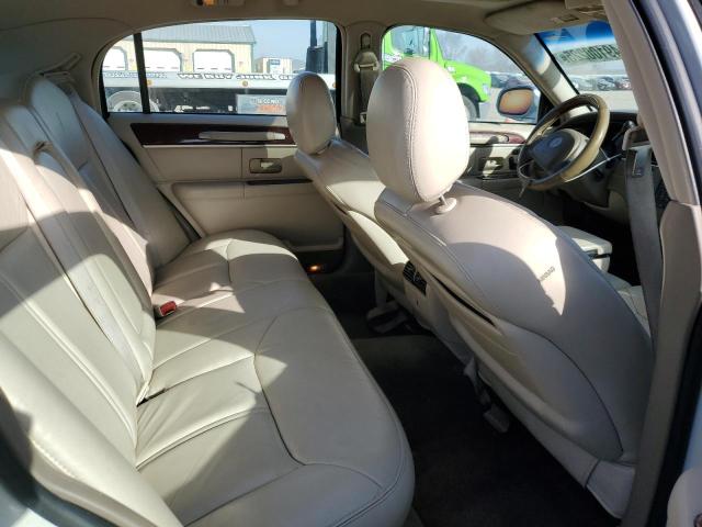 Photo 10 from auction – 2004 LINCOLN TOWN CAR U with VIN 1LNHM83W74Y670704