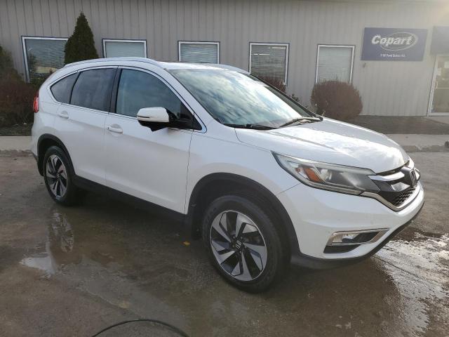 Photo 4 from auction – 2015 HONDA CR-V TOURI with VIN 5J6RM4H96FL024861
