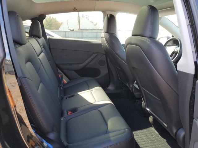 Photo 11 from auction – 2023 TESLA MODEL Y with VIN 7SAYGDEE1PA191028