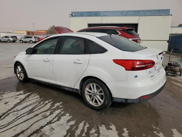 Снимка 2 от търг – 2017 FORD FOCUS SE с VIN 1FADP3F27HL304272