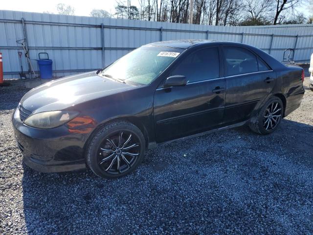 TOYOTA CAMRY LE 2004 with VIN 4T1BE32KX4U304988 - Photo from auction