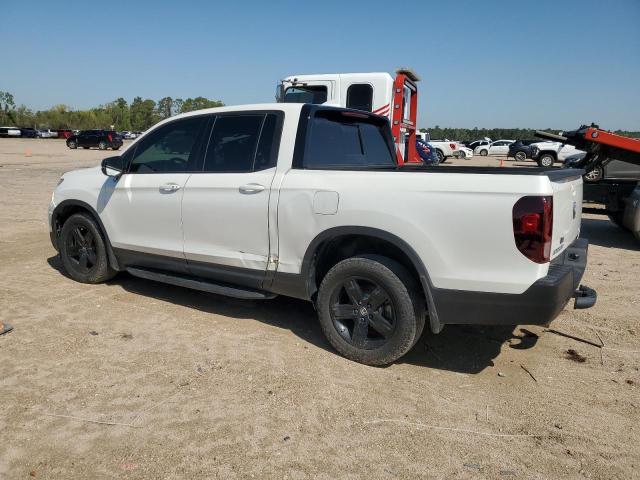 Photo 2 from auction – 2021 HONDA RIDGELINE with VIN 5FPYK3F88MB018367