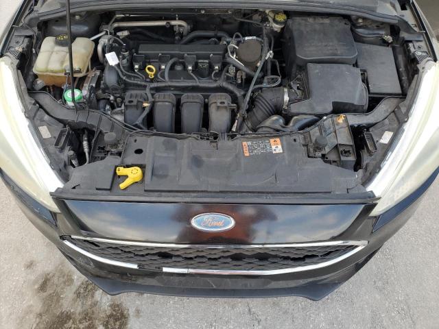 Снимка 12 от търг – 2015 FORD FOCUS с VIN 1FADP3K23FL325204
