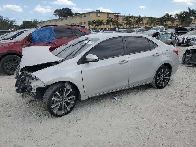 TOYOTA COROLLA L 2019 with VIN 5YFBURHE9KP921546 - Photo from auction