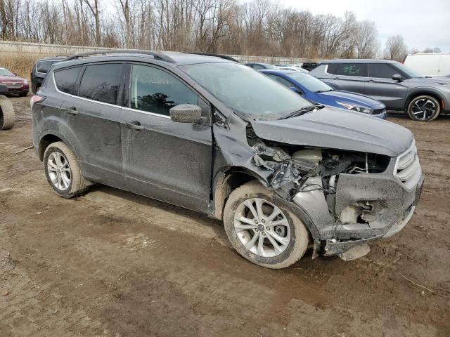 Photo 4 from auction – 2018 FORD ESCAPE SE with VIN 1FMCU9GD0JUB68614