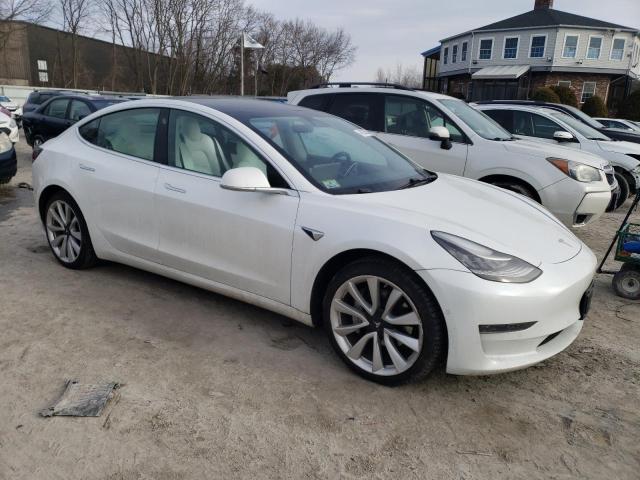 Снимка 4 от търг – 2019 TESLA MODEL 3 с VIN 5YJ3E1EA6KF444817