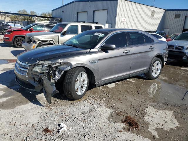 FORD TAURUS SEL 2013 with VIN 1FAHP2E80DG174890 - Photo from auction