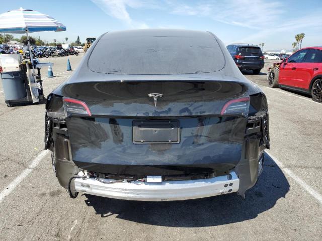 Снимка 6 от търг – 2024 TESLA MODEL Y с VIN 7SAYGDED9RF194952