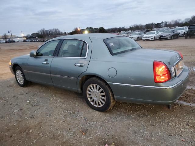 Photo 2 from auction – 2004 LINCOLN TOWN CAR E with VIN 1LNHM81W04Y649387