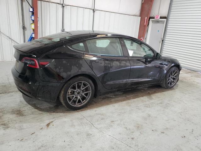 Снимка 3 от търг – 2022 TESLA MODEL 3 с VIN 5YJ3E1EA2NF190088