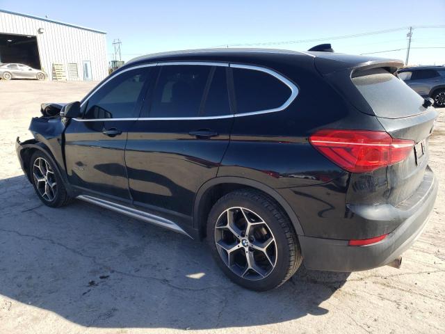 Photo 2 from auction – 2017 BMW X1 XDRIVE2 with VIN WBXHT3Z30H4A58256