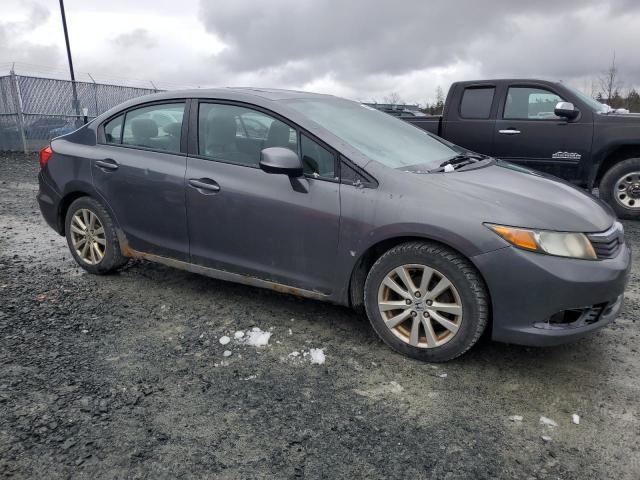 Photo 4 from auction – 2012 HONDA CIVIC LX with VIN 2HGFB2F51CH113170