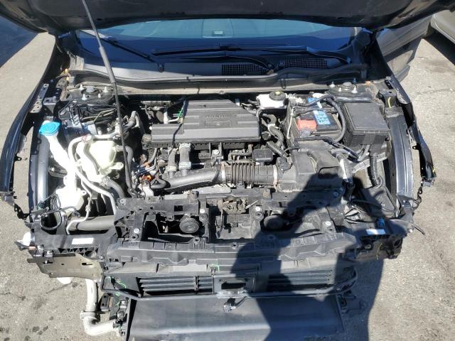 Photo 12 from auction – 2021 HONDA CR-V SE with VIN 5J6RW2H77ML023809