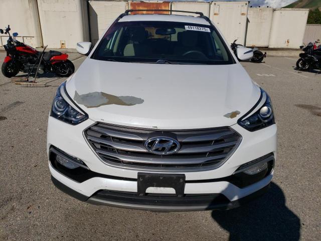 Photo 5 from auction – 2018 HYUNDAI SANTA FE with VIN 5NMZU3LB5JH079919