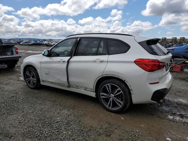 Photo 2 from auction – 2016 BMW X1 XDRIVE2 with VIN WBXHT3C32G5E55579