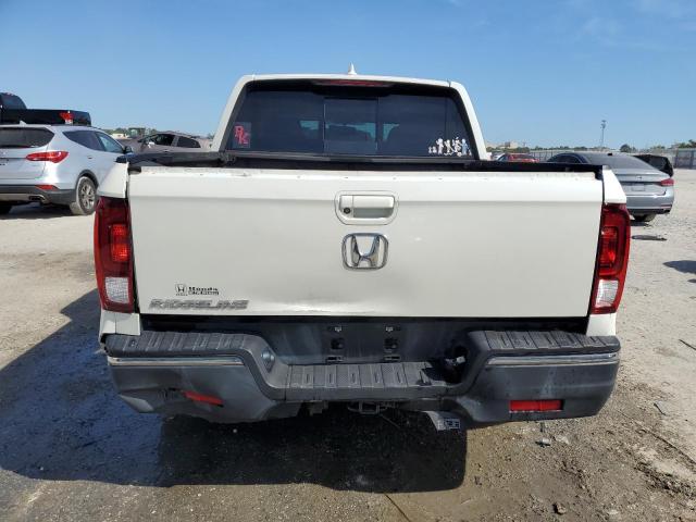Photo 6 from auction – 2019 HONDA RIDGELINE with VIN 5FPYK2F62KB002624